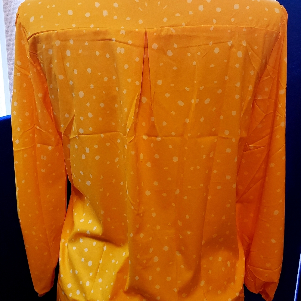Boutique yellow polka dot button down blouse sleeve